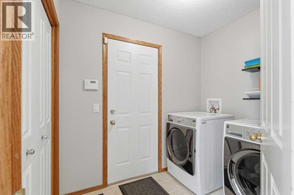 128 Douglas Ridge Close Se, Calgary, Alberta  T2Z 2M3 - Photo 16 - A2352977