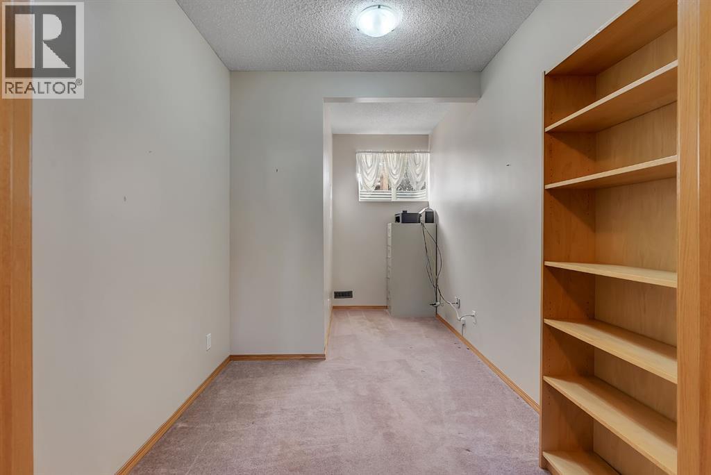 82 Bridleridge Road SW, Calgary, Alberta  T2Y 4E1 - Photo 29 - A2351149