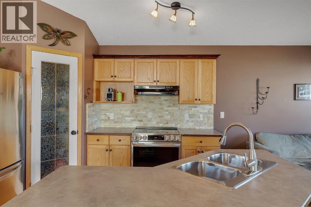 82 Bridleridge Road SW, Calgary, Alberta  T2Y 4E1 - Photo 12 - A2351149