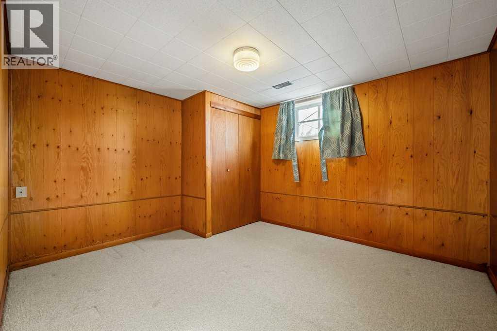 5607 Buckthorn Road NW, Calgary, Alberta  T2K 2Y6 - Photo 21 - A2351817
