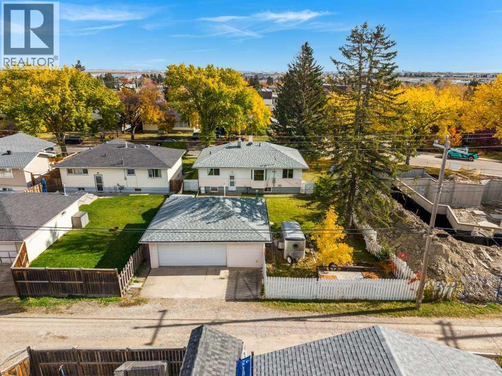 5607 Buckthorn Road NW, Calgary, Alberta  T2K 2Y6 - Photo 30 - A2351817