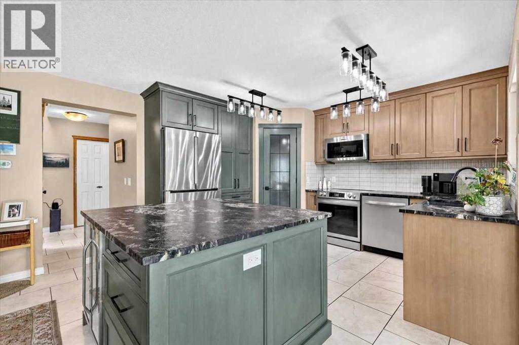 47 Cimarron Hill, Okotoks, Alberta  T1S 1M9 - Photo 9 - A2347740