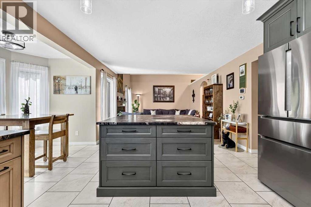 47 Cimarron Hill, Okotoks, Alberta  T1S 1M9 - Photo 13 - A2347740