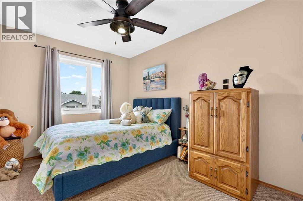 47 Cimarron Hill, Okotoks, Alberta  T1S 1M9 - Photo 31 - A2347740