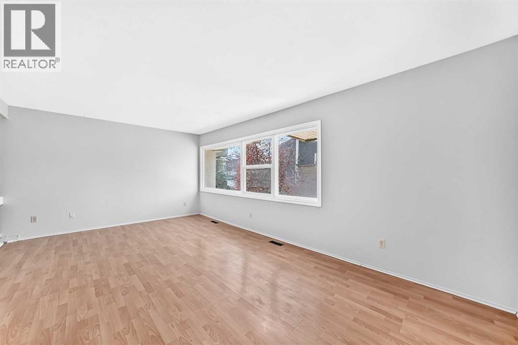 410 Brae Glen Crescent SW, Calgary, Alberta  T2W 1B6 - Photo 7 - A2351994