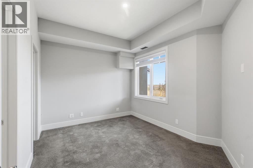 2460, 2330 Fish Creek Boulevard Sw, Calgary, Alberta  T2Y 0L1 - Photo 11 - A2350263