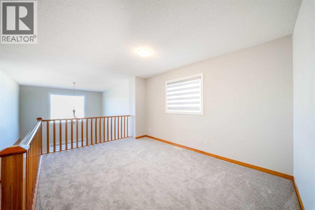 38 Everhollow Rise SW, Calgary, Alberta  T2Y 5H2 - Photo 11 - A2350532