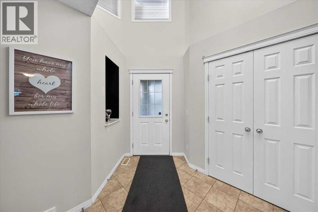 117 Panora Way NW, Calgary, Alberta  T3K 0R4 - Photo 2 - A2351873