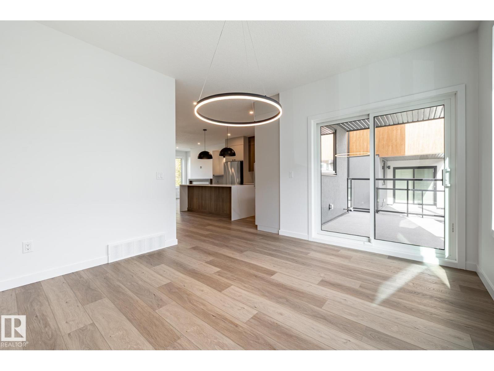 7443 May Common Nw Nw, Edmonton, Alberta  T6R 0X4 - Photo 6 - E4513375