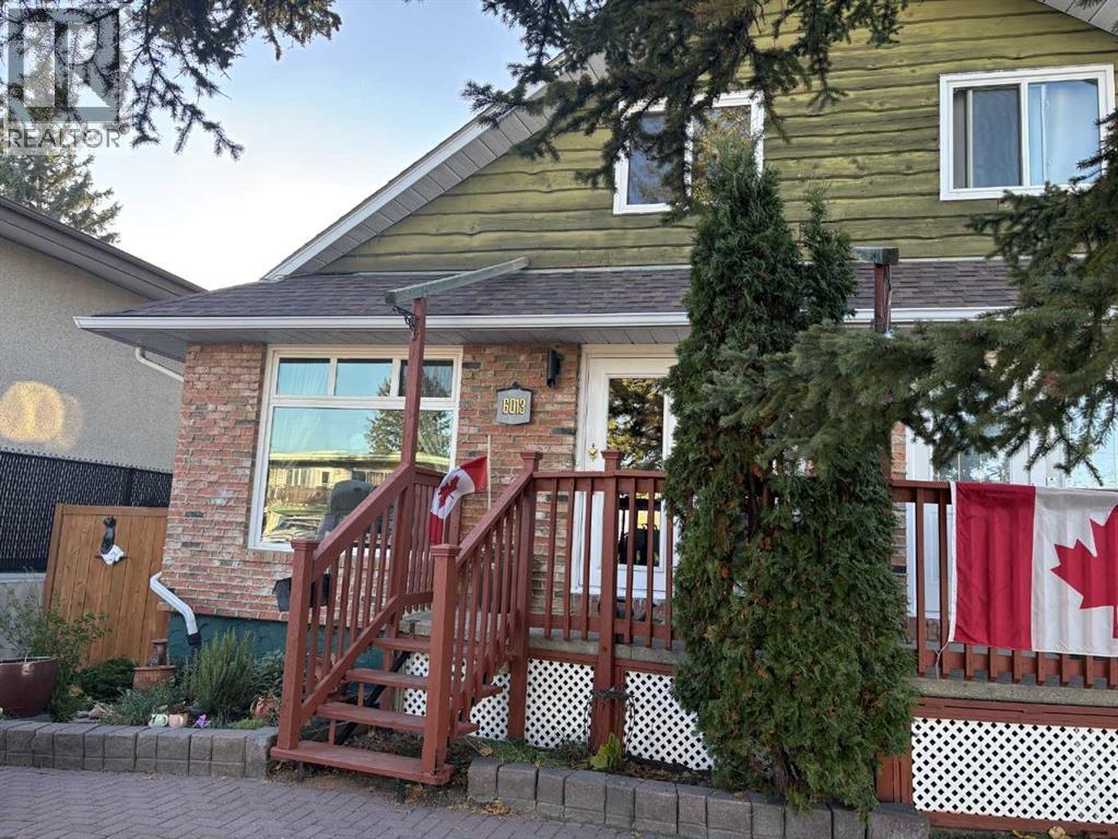 6013 Trollinger Street NE, Calgary, Alberta  T2K 3W5 - Photo 2 - A2352953