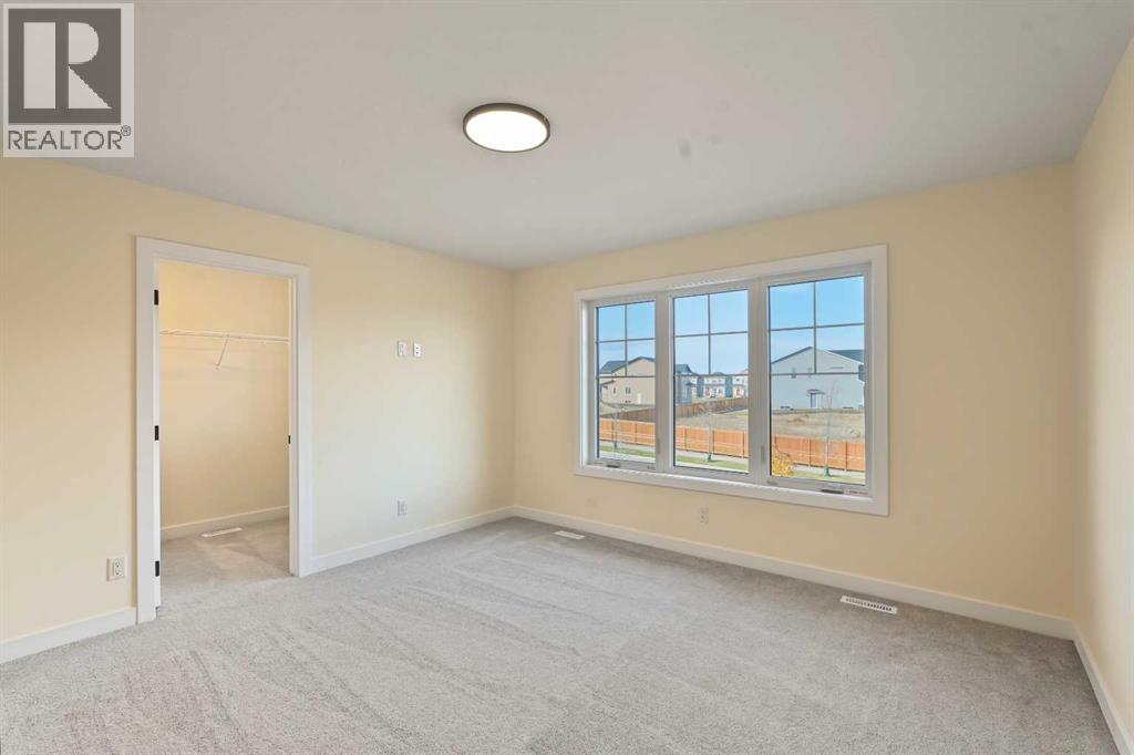 129 Bridgeport Gate, Chestermere, Alberta  T1X 3E2 - Photo 25 - A2352779