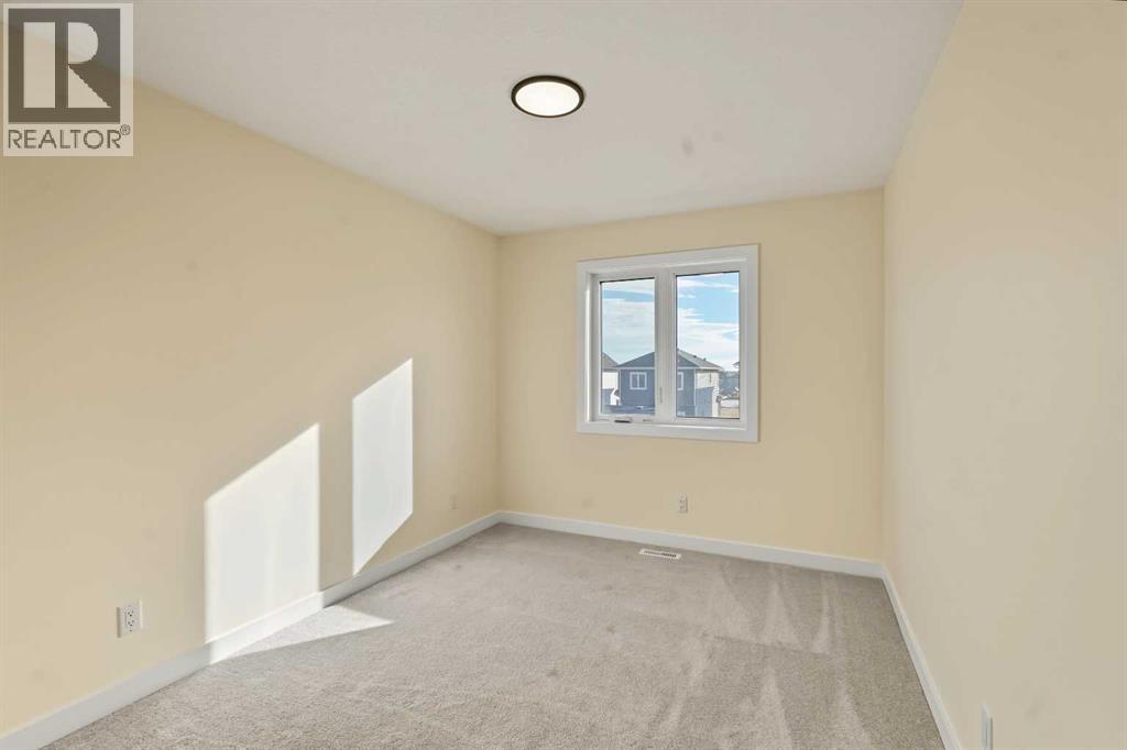 129 Bridgeport Gate, Chestermere, Alberta  T1X 3E2 - Photo 23 - A2352779