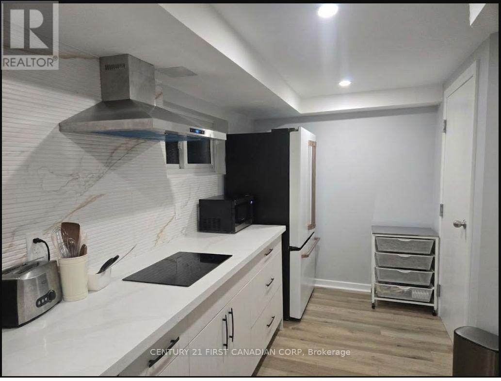 Lower - 54 Waterford Drive, Toronto, Ontario  M9R 2N6 - Photo 7 - W14091148