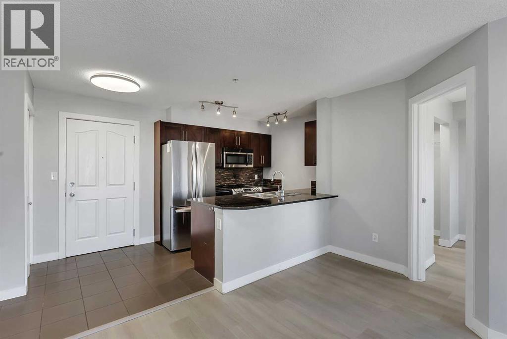 2402, 403 Mackenzie Way Sw, Airdrie, Alberta  T4B 3V7 - Photo 4 - A2352959