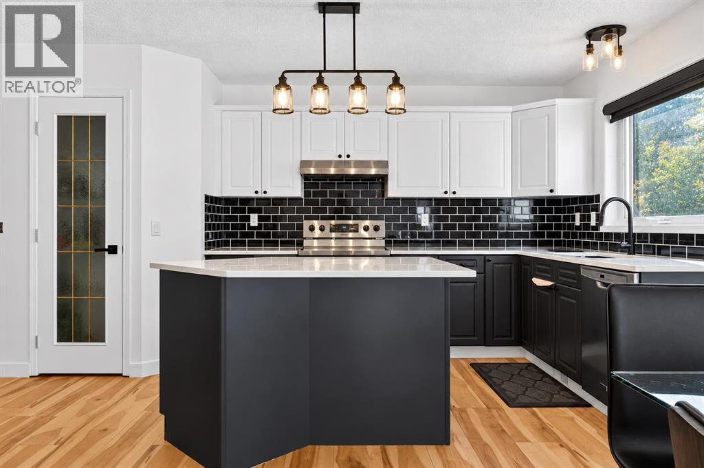45 Bow Ridge Drive, Cochrane, Alberta  T4C 1V5 - Photo 1 - A2353124