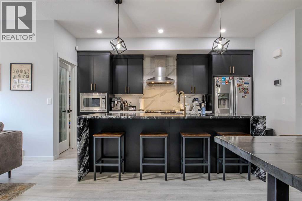 250 Aquila Way NW, Calgary, Alberta  T3R 1Z9 - Photo 8 - A2351964