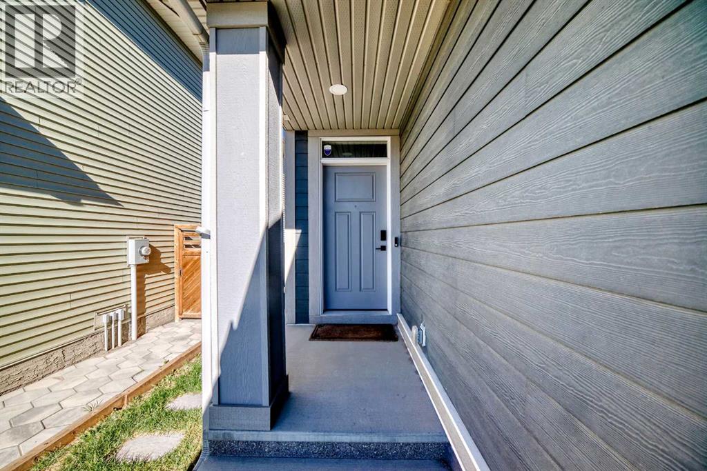 227 Creekstone Way SW, Calgary, Alberta  T2X 4R2 - Photo 4 - A2352501