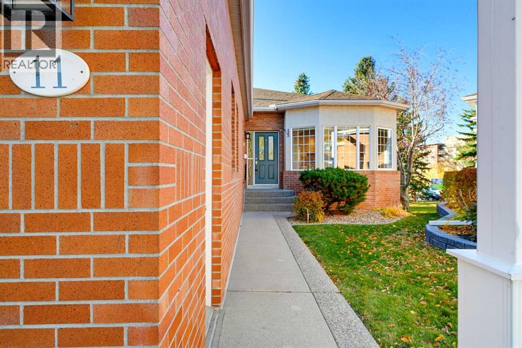 11 Prominence Point SW, Calgary, Alberta  T3H 3E8 - Photo 2 - A2352417