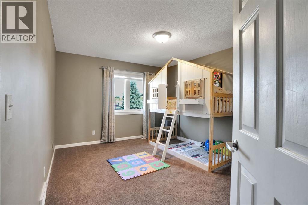 331 Wood Valley Bay SW, Calgary, Alberta  T2W 5Y6 - Photo 29 - A2353156