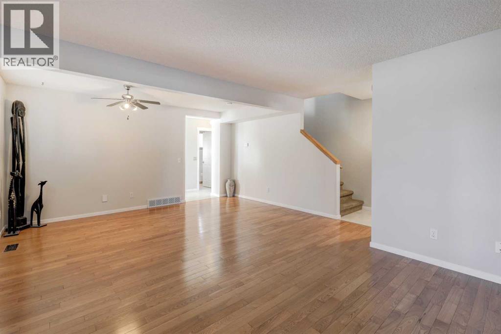 28 Woodside Circle Nw, Airdrie, Alberta  T4B 2H8 - Photo 9 - A2351886