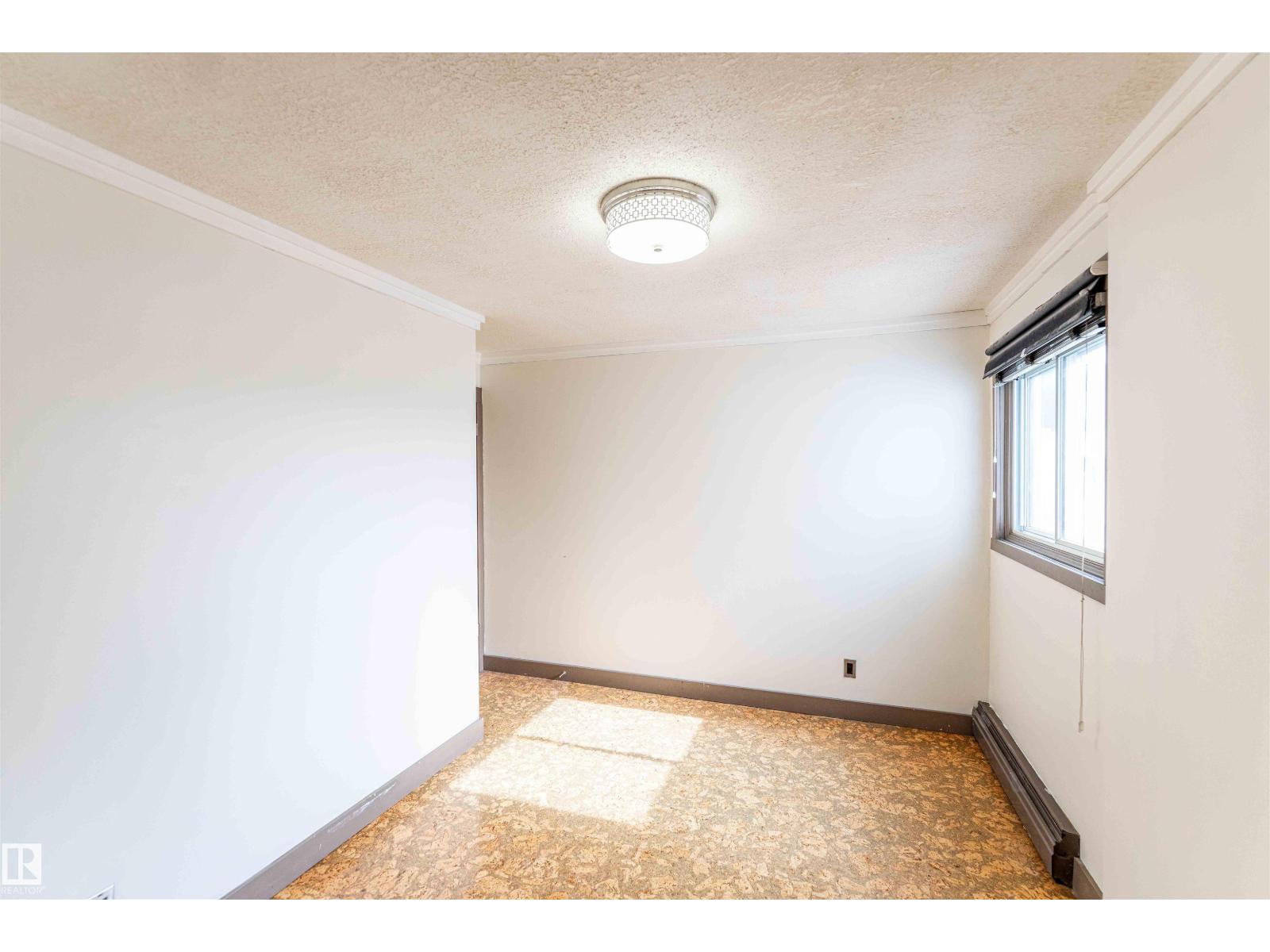 #302 10745 83 AV NW