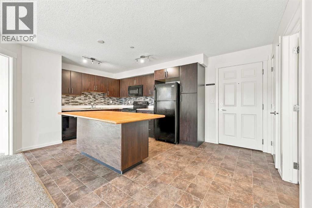 1306, 755 Copperpond Boulevard SE, Calgary, Alberta  T2Z 4R2 - Photo 5 - A2346169