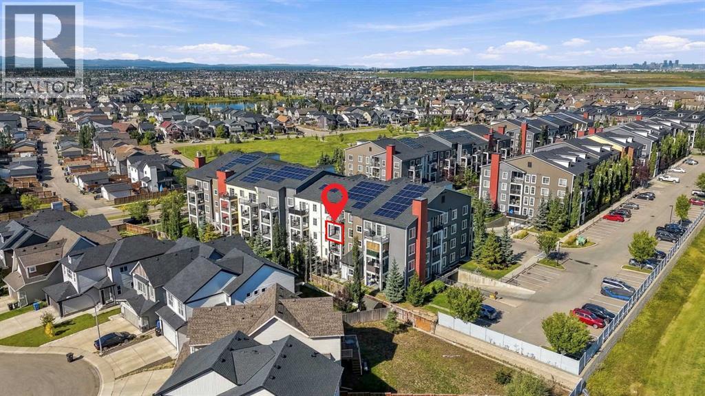 1306, 755 Copperpond Boulevard SE, Calgary, Alberta  T2Z 4R2 - Photo 1 - A2346169