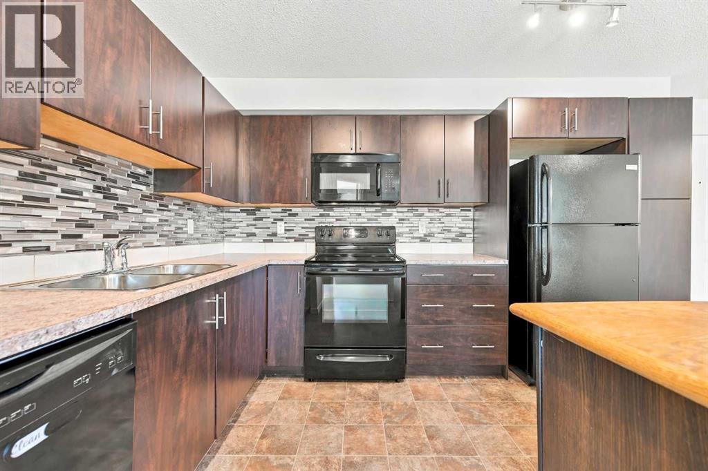 1306, 755 Copperpond Boulevard SE, Calgary, Alberta  T2Z 4R2 - Photo 6 - A2346169