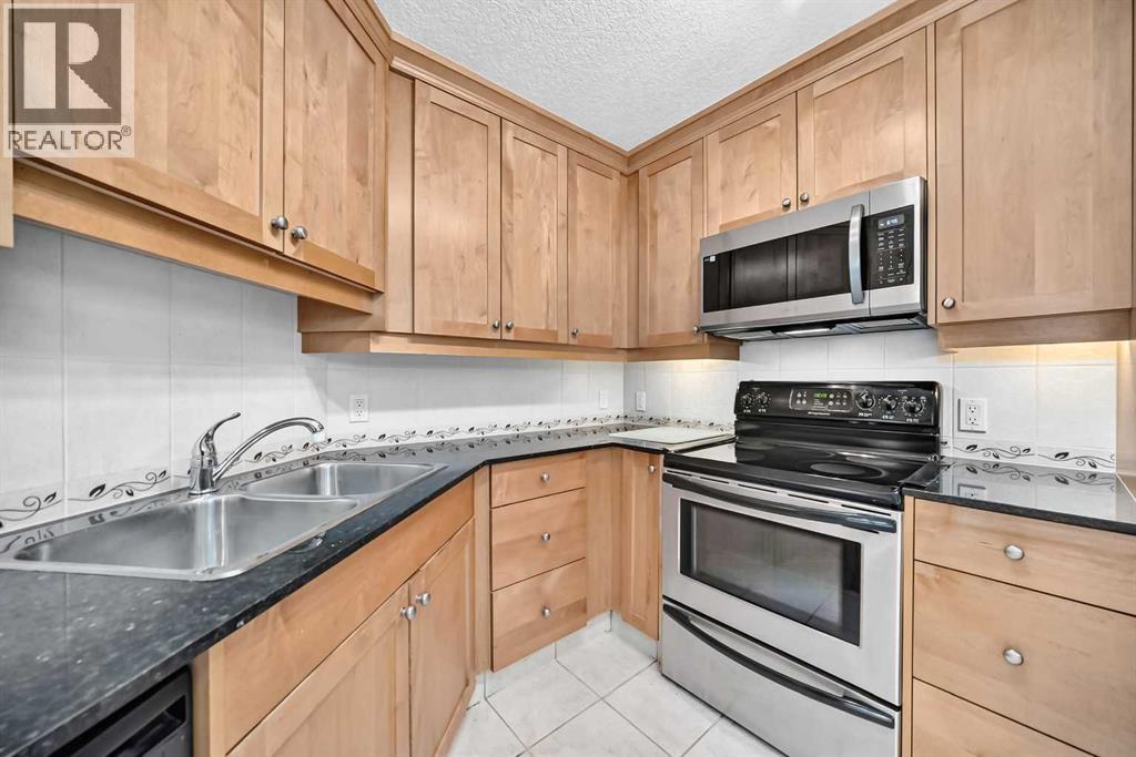 201, 4554 Valiant Drive NW, Calgary, Alberta  T3A 2V5 - Photo 9 - A2348365