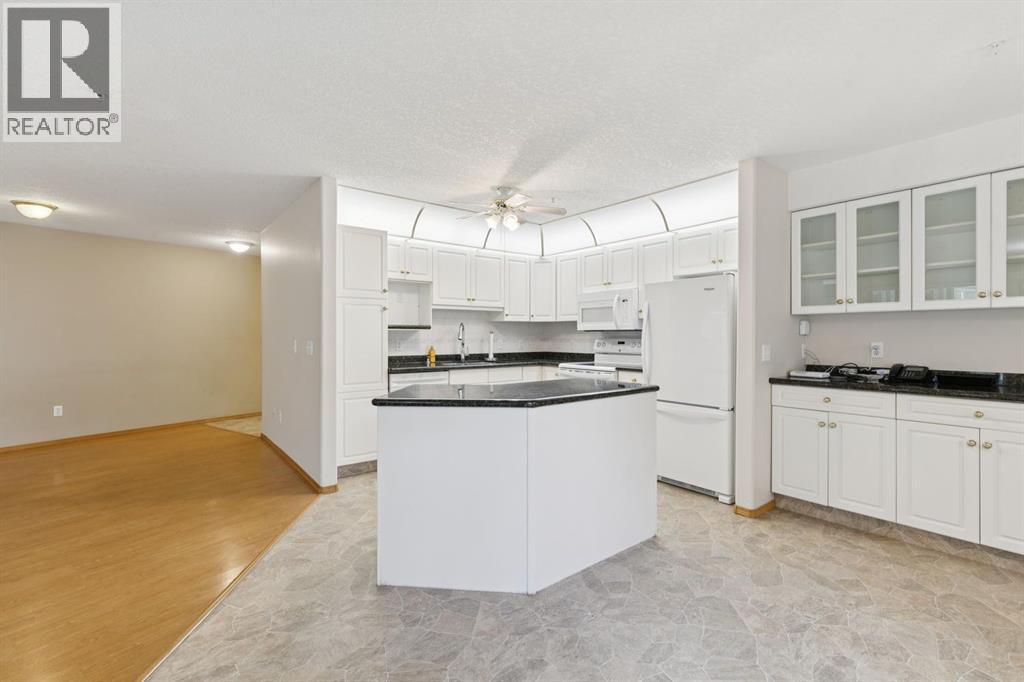 107, 7239 Sierra Morena Boulevard Sw, Calgary, Alberta  T3H 3L7 - Photo 8 - A2349309