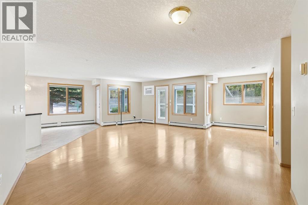 107, 7239 Sierra Morena Boulevard Sw, Calgary, Alberta  T3H 3L7 - Photo 4 - A2349309