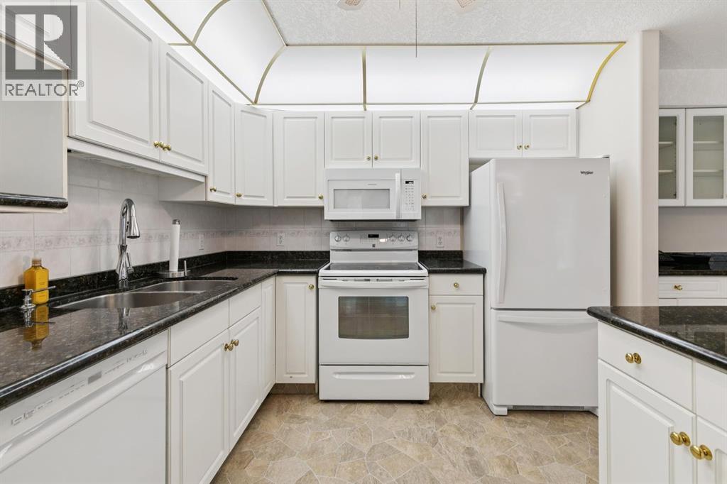 107, 7239 Sierra Morena Boulevard Sw, Calgary, Alberta  T3H 3L7 - Photo 9 - A2349309