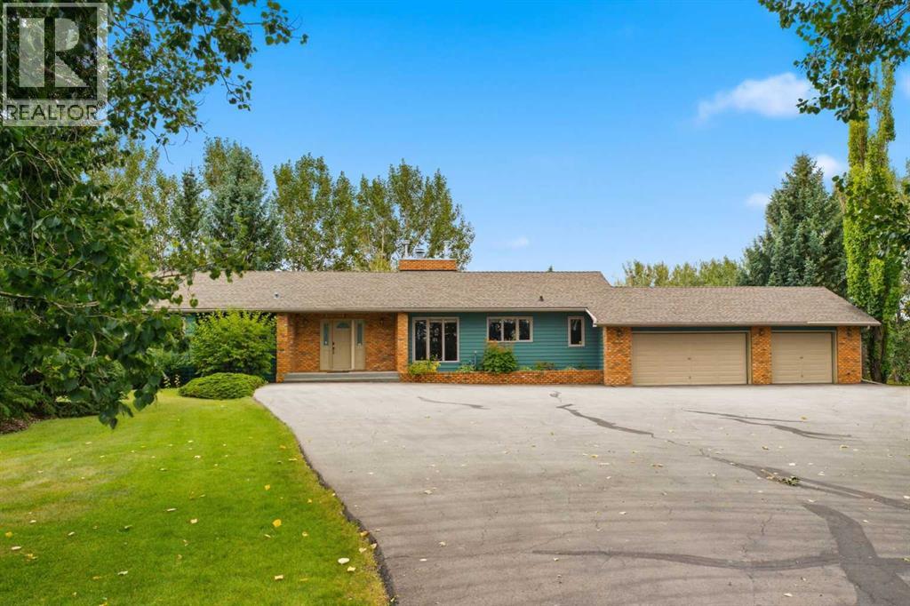 30175 Woodland Way, Rural Rocky View County, Alberta  T3R 1G7 - Photo 1 - A2345159