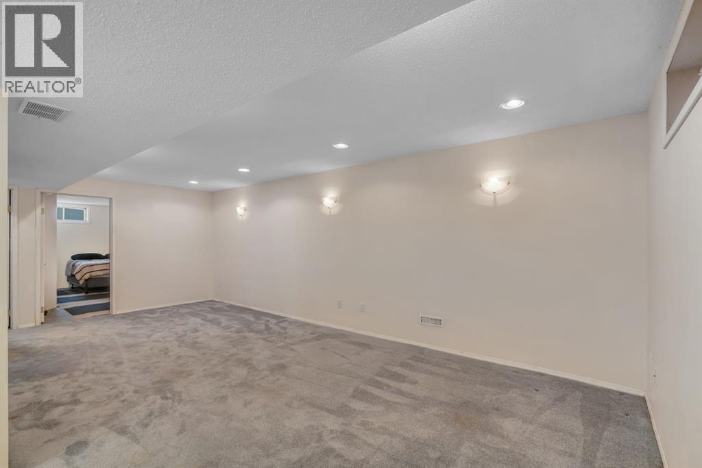 64 Huntham Road Ne, Calgary, Alberta  T2K 4G1 - Photo 22 - A2352143