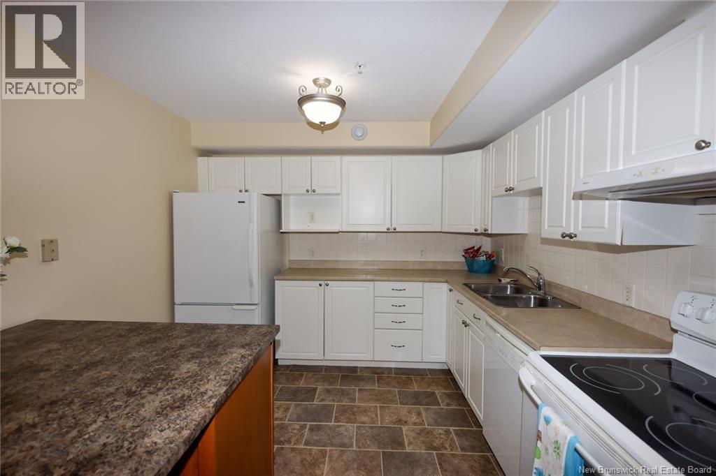 1 Golf Greens Lane Unit# 213, Fredericton, New Brunswick  E3B 9T9 - Photo 12 - NB149923