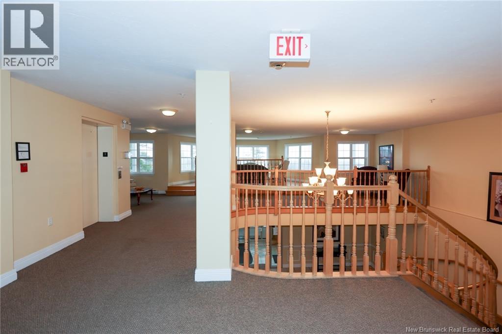 1 Golf Greens Lane Unit# 213, Fredericton, New Brunswick  E3B 9T9 - Photo 21 - NB149923