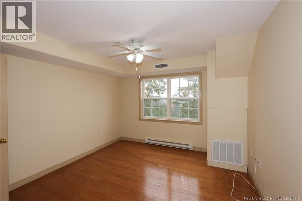 1 Golf Greens Lane Unit# 213, Fredericton, New Brunswick  E3B 9T9 - Photo 20 - NB149923