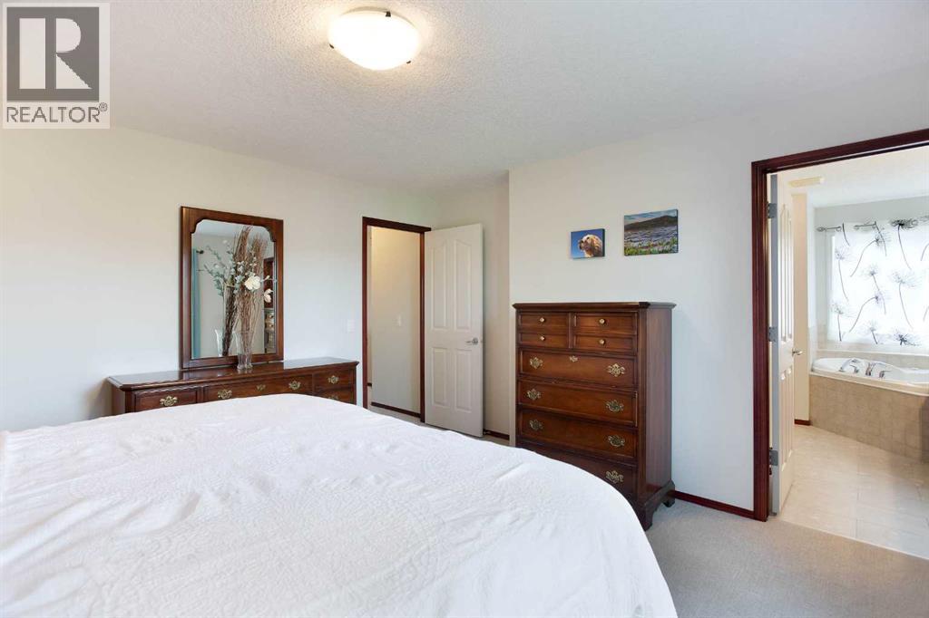 66 Cougarstone Close SW, Calgary, Alberta  T3H 5J4 - Photo 23 - A2348223