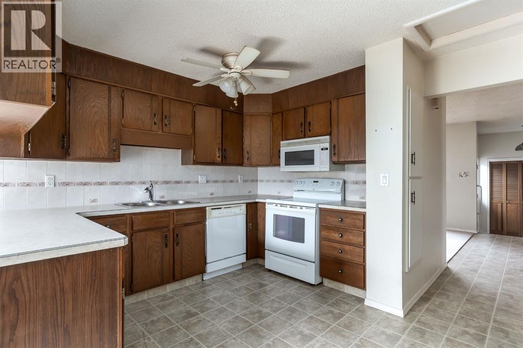 4724 Nipawin Crescent NW, Calgary, Alberta  T2K 2H9 - Photo 7 - A2348956