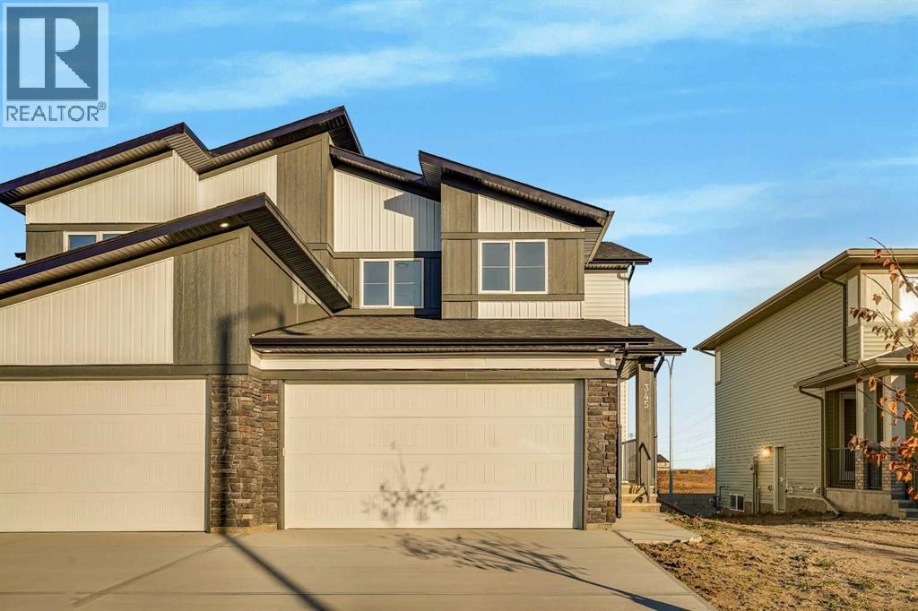 345 Dawson Wharf Road, Chestermere, Alberta  T1X 2W4 - Photo 1 - A2352624
