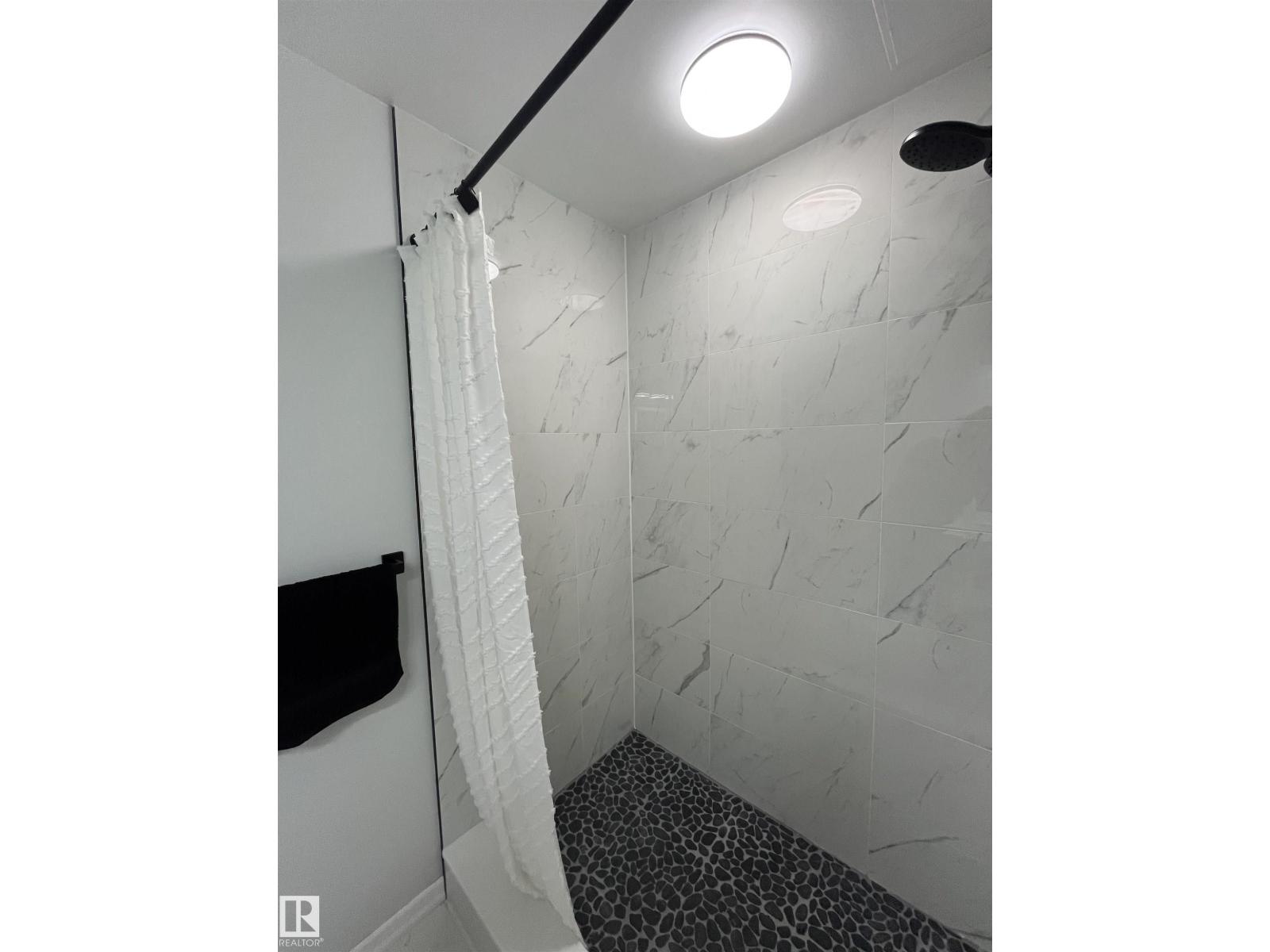#101 10140 120 ST NW