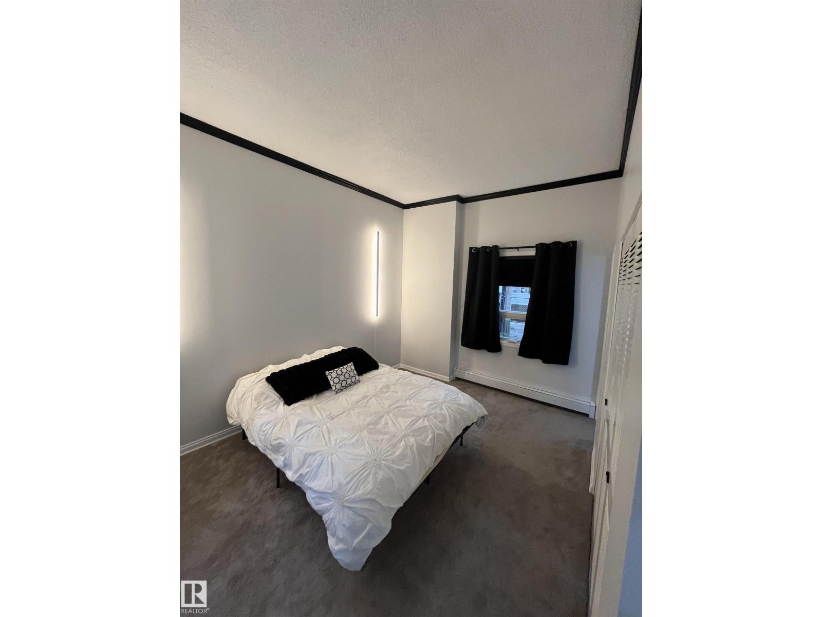 #101 10140 120 ST NW