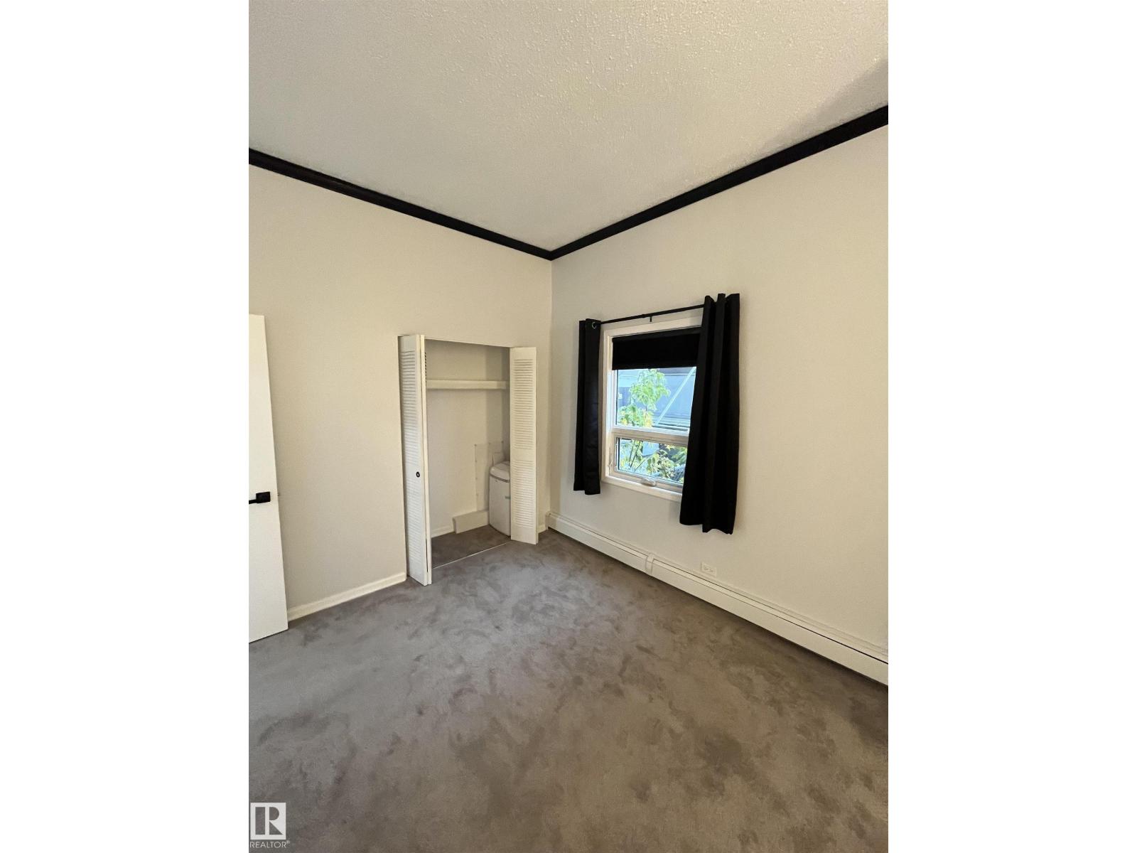 #101 10140 120 ST NW