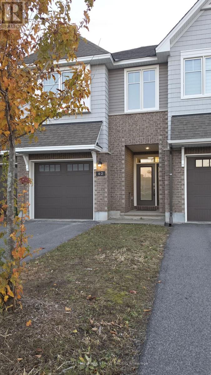 Beautiful open-concept executive townhome available for rent in the highly desirable Findlay Creek community. The main floor features high ceilings, a ceramic-tile foyer, gleaming hardwood in the living and dining rooms, a gas fireplace, and a modern kitchen with a separate pantry, ceramic floors, a quartz breakfast bar, and all attractive stainless steel appliances. On the upper level, the primary suite offers two walk-in closets and a 4-piece ensuite with a Roman tub and an oversized separate shower. This level also includes two generously sized bedrooms, each with a walk-in closet, plus a spacious 4-piece main bathroom and a convenient laundry room, both with quartz countertops. Offering more than 2,000 sq. ft. of living space, the home also has a large, bright, fully finished basement family room with an open stairwell, ideal for a variety of uses, as well as plenty of storage and utility spaces. Conveniently located near parks, schools, shopping, transit, and more. Allergy-free home: no pets, no smoking. One-year minimum lease. Applicants must submit a rental application, proof of income, and a full credit history report that includes their credit score. (id:48254)