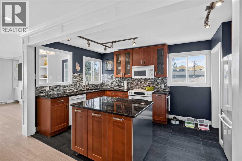 21 Rossmere Road Sw, Calgary, Alberta  T3C 2N8 - Photo 9 - A2338399