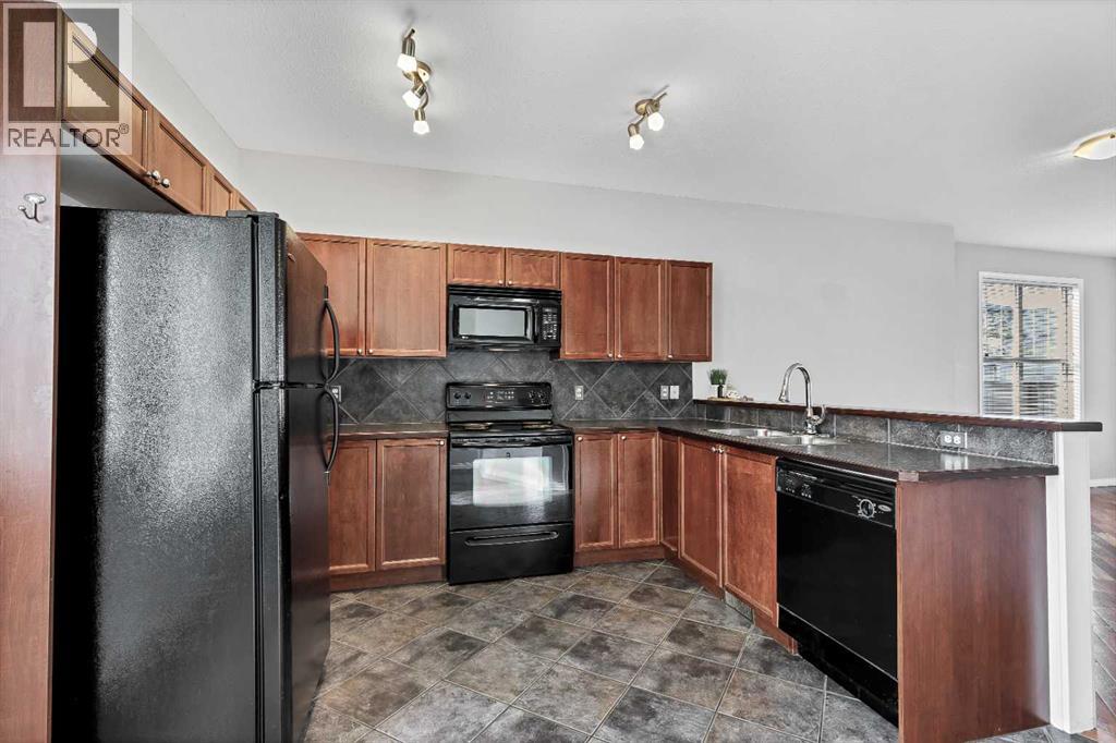 101, 703 Luxstone Square Sw, Airdrie, Alberta  T4B 0A3 - Photo 8 - A2350744
