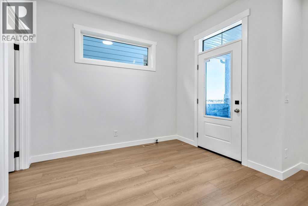 15457 45 Street SW, Calgary, Alberta  T2Y 1E2 - Photo 2 - A2353044