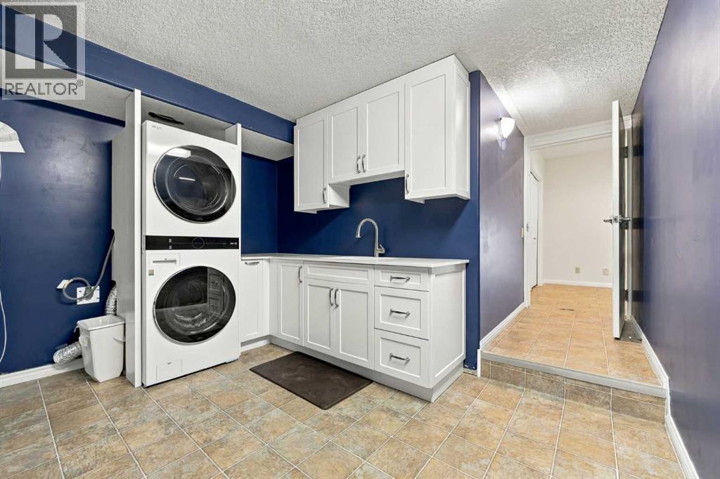 65 Aspen Ridge Crescent Sw, Calgary, Alberta  T3H 5J8 - Photo 44 - A2349019