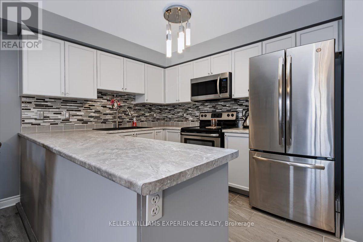13 - 137 Sydenham Wells, Barrie, Ontario  L4M 0G7 - Photo 4 - S14098194