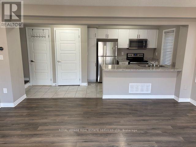 63 Bond Head Court, Milton, Ontario  L9E 1G4 - Photo 4 - W14098100